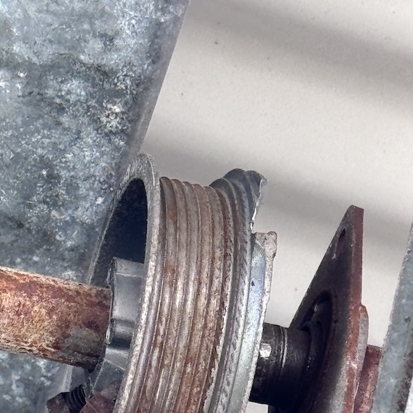 Replaced broken pulley and move right track back into position and re-mount the wall